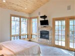  Come relax in the Western Calif. King Master suite with a gas fireplace, TV and doors to the deck